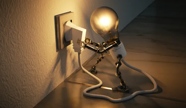 Factura de servicios públicos y contador de energía en una vivienda de Bucaramanga